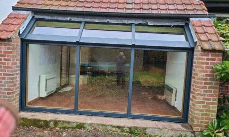 Installation d'une verrière mixte bois-aluminium RAL 7016 à Bouvines